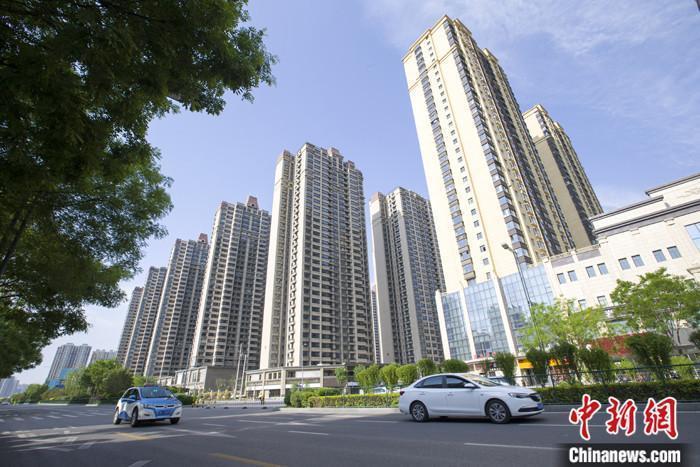 資料圖：車輛從一樓盤前經過。 <a target='_blank' href='/'><p  align=